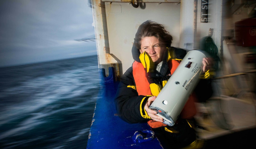 Researcher Dr Susannah Calderan about to deploy one of the sonobuoys used to record blue whale calls and songs. Photo: Dave Allen, Australian Antarctic Division